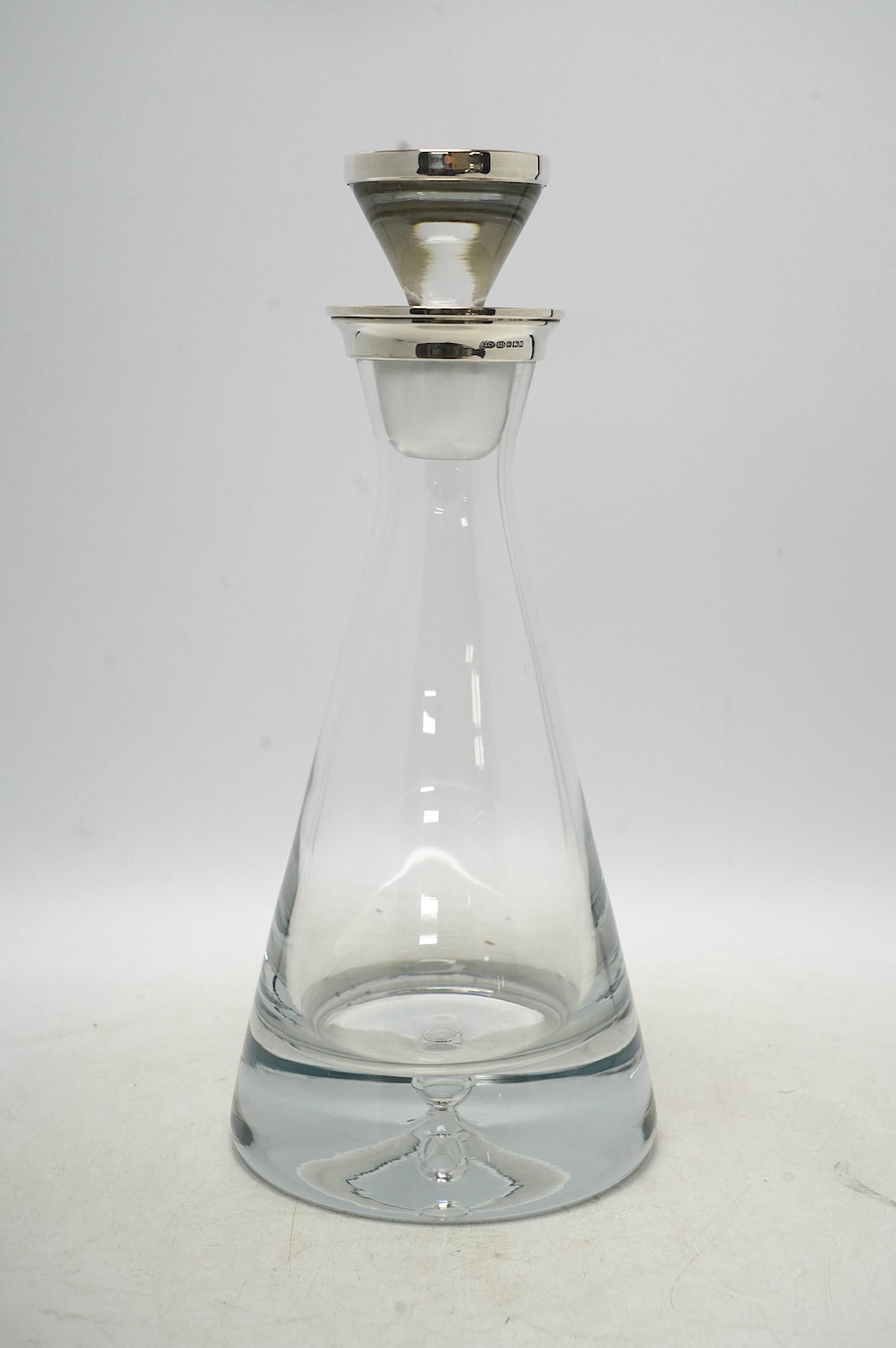 A modern silver mounted heavy glass decanter and stopper, by Broadway & Co of Birmingham, overall height 32cm. Condition - good